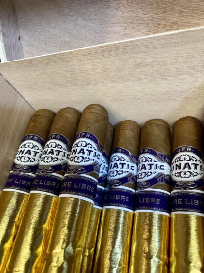 A box of natis cigars in the middle of its packaging.