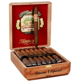 A box of cigars with the top opened to show the inside.