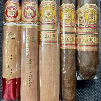 A group of cigars that are sitting on the floor.