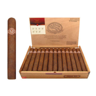A box of cigars with the cigar in front.